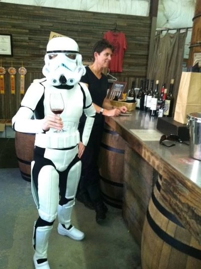 Guest in costume as Starwars Stormtrooper tasting Port on Halloween