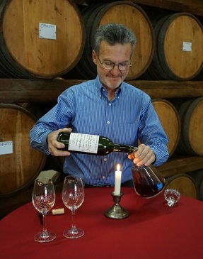 Peter Ficklin decanting by candlelight