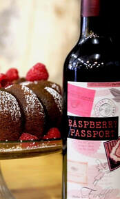 Easy Raspberry PassPort Cake and bottle of Raspberry PassPort