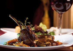 Plated lamb chops with glass of Port